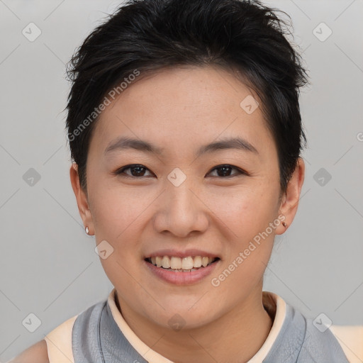 Joyful asian young-adult female with short  brown hair and brown eyes