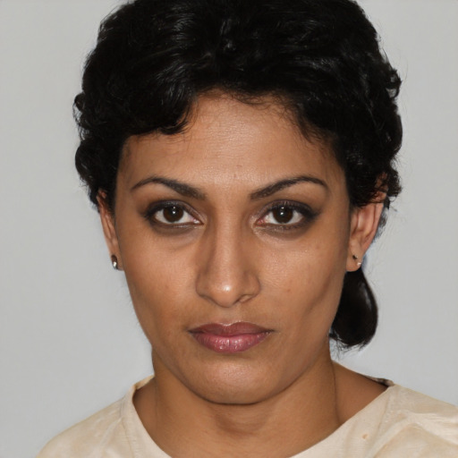 Neutral latino young-adult female with short  black hair and brown eyes
