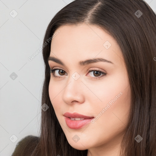 Neutral white young-adult female with long  brown hair and brown eyes