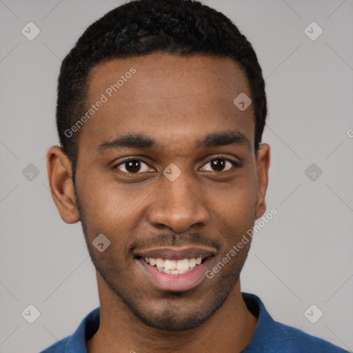 Joyful black young-adult male with short  brown hair and brown eyes