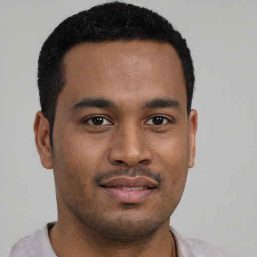 Neutral latino young-adult male with short  brown hair and brown eyes