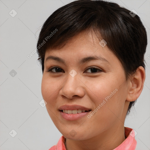 Joyful asian young-adult female with short  brown hair and brown eyes