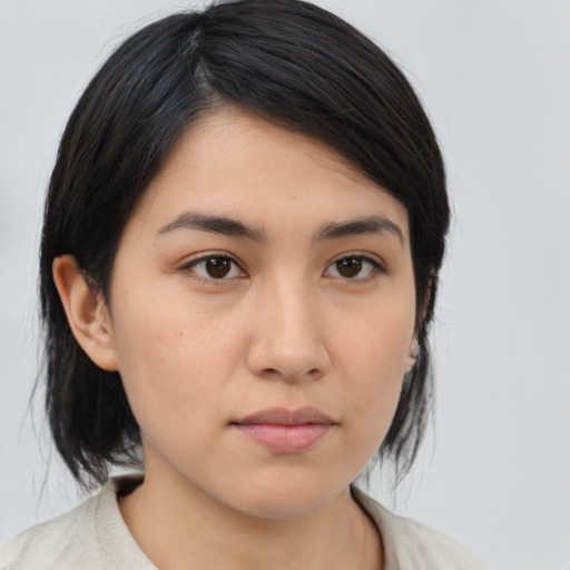 Neutral asian young-adult female with medium  brown hair and brown eyes