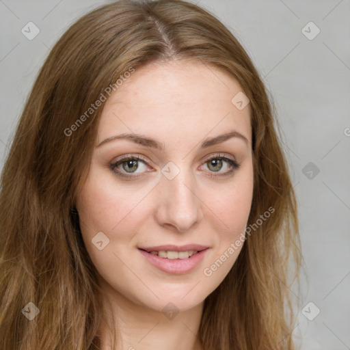 Joyful white young-adult female with long  brown hair and green eyes