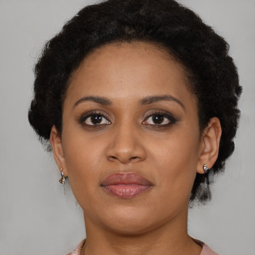 Neutral black young-adult female with short  brown hair and brown eyes