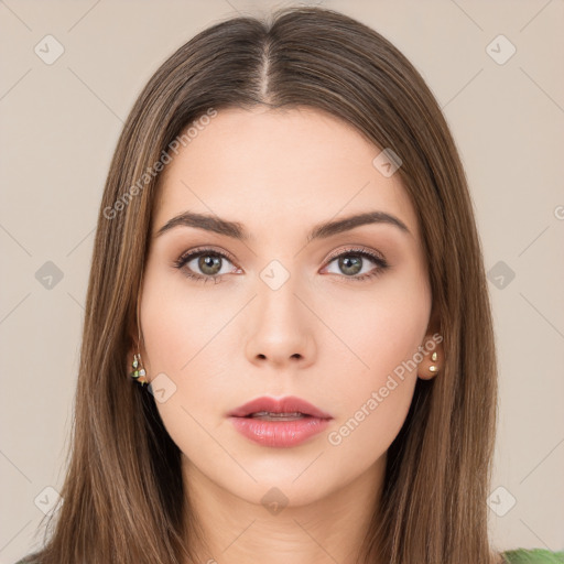 Neutral white young-adult female with long  brown hair and brown eyes