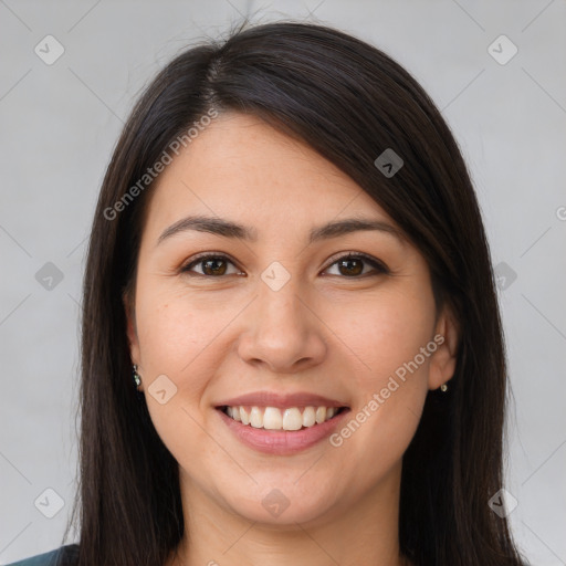 Joyful white young-adult female with long  brown hair and brown eyes