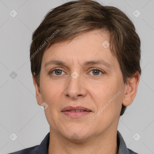 Joyful white adult female with short  brown hair and brown eyes