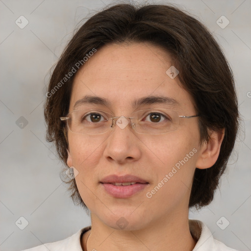 Joyful white adult female with medium  brown hair and brown eyes