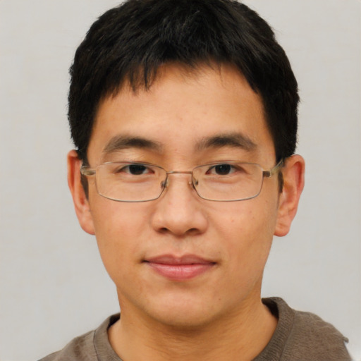Neutral asian adult male with short  brown hair and brown eyes