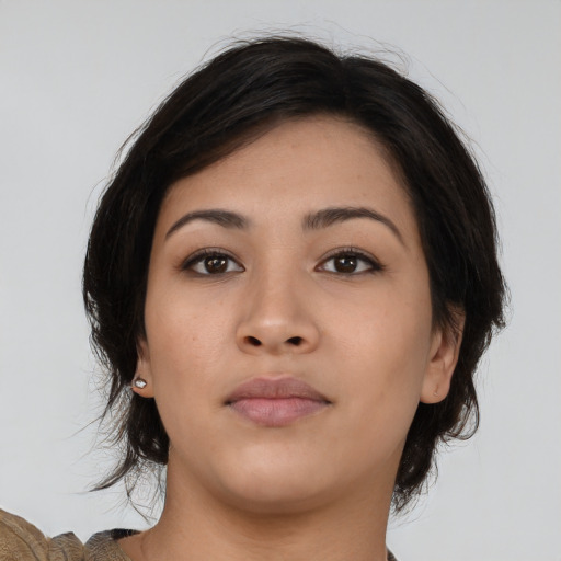 Neutral asian young-adult female with medium  brown hair and brown eyes