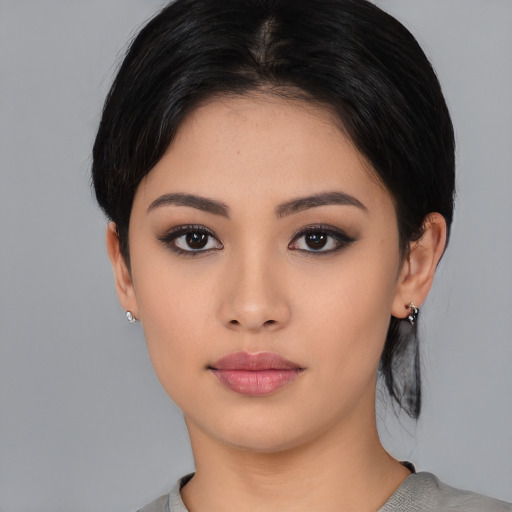 Neutral asian young-adult female with medium  black hair and brown eyes
