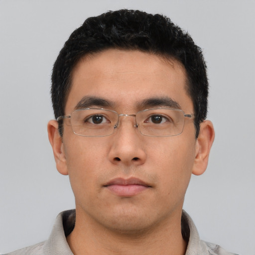 Neutral asian young-adult male with short  brown hair and brown eyes