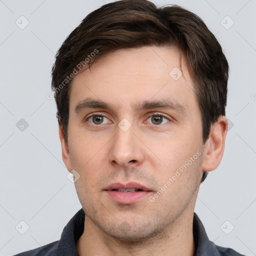 Neutral white young-adult male with short  brown hair and brown eyes