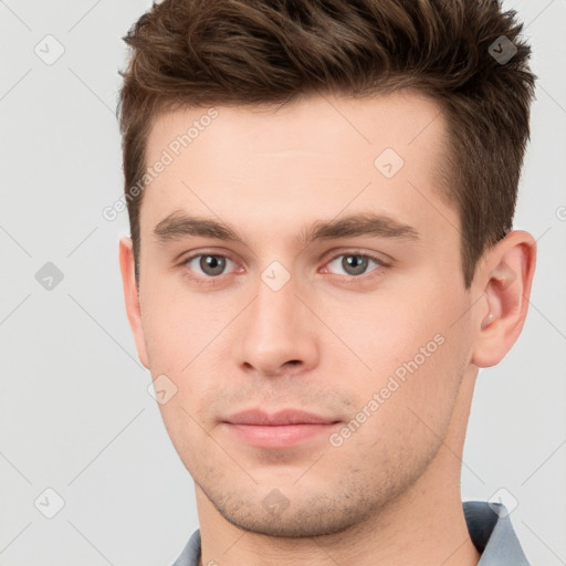 Neutral white young-adult male with short  brown hair and brown eyes