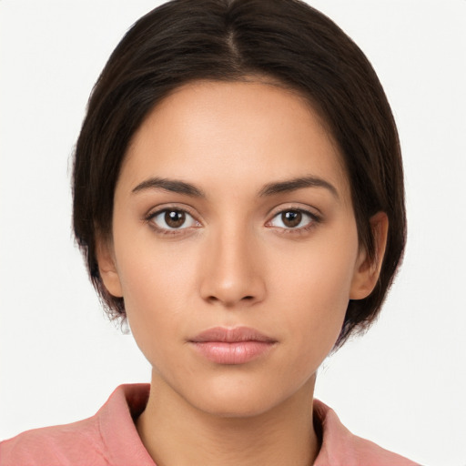 Neutral white young-adult female with medium  brown hair and brown eyes