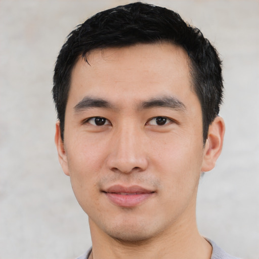 Neutral asian young-adult male with short  black hair and brown eyes