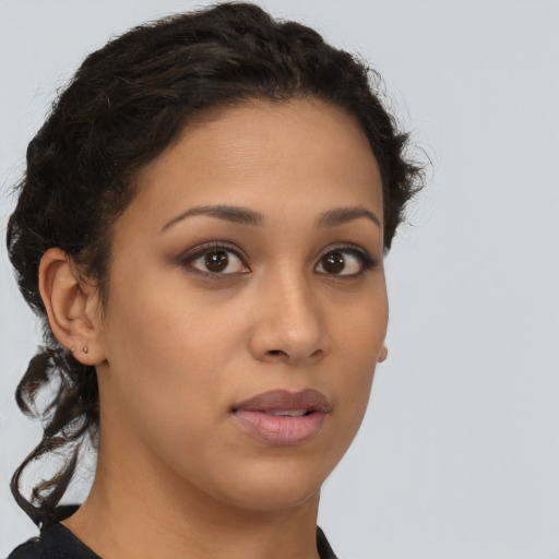 Neutral latino young-adult female with short  brown hair and brown eyes