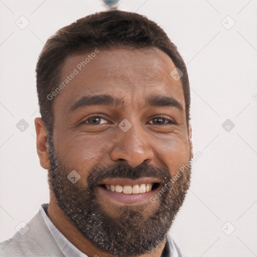 Joyful black young-adult male with short  brown hair and brown eyes
