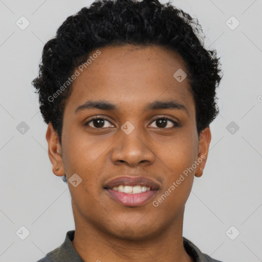 Joyful black young-adult male with short  black hair and brown eyes