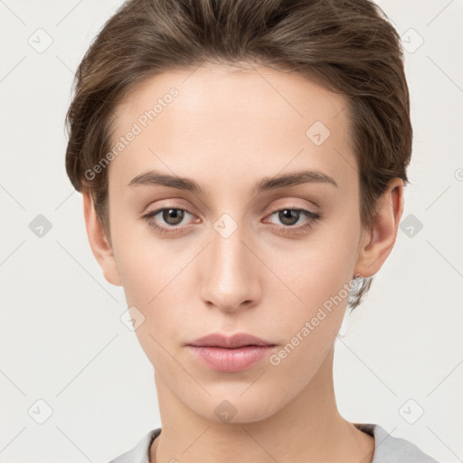 Neutral white young-adult female with short  brown hair and brown eyes