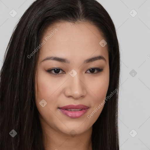 Joyful asian young-adult female with long  brown hair and brown eyes