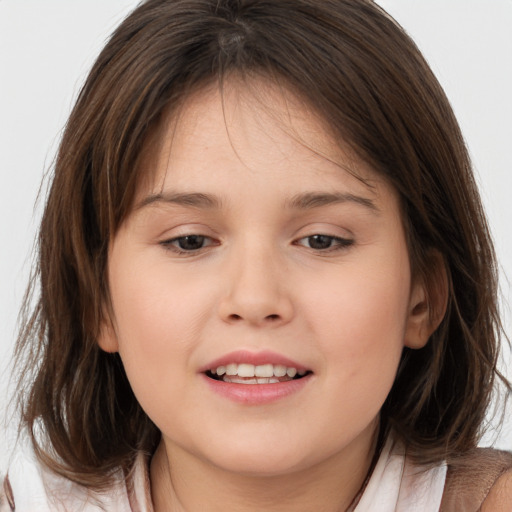 Joyful white child female with medium  brown hair and brown eyes