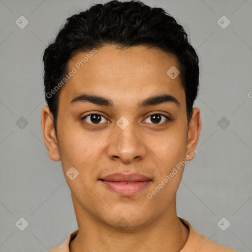 Joyful latino young-adult male with short  black hair and brown eyes