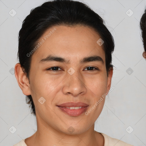 Joyful asian young-adult male with short  brown hair and brown eyes