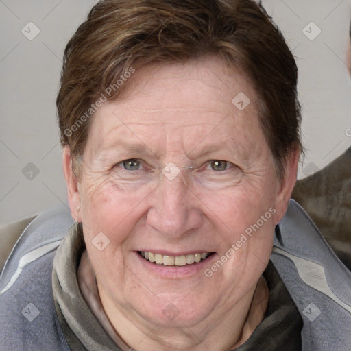 Joyful white adult female with medium  brown hair and blue eyes