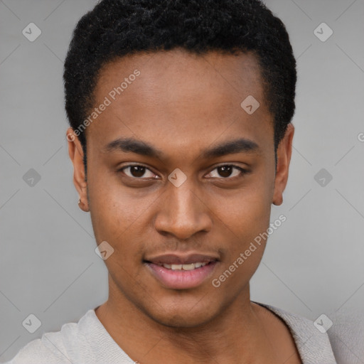 Joyful black young-adult male with short  brown hair and brown eyes