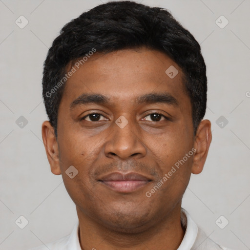 Joyful latino young-adult male with short  black hair and brown eyes