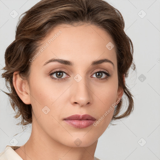 Joyful white young-adult female with medium  brown hair and green eyes