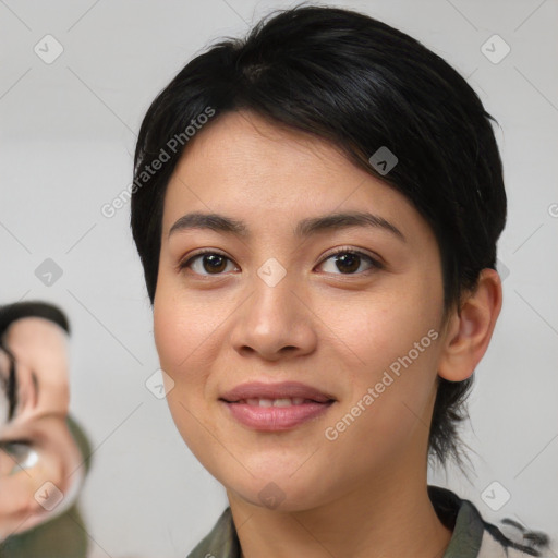 Joyful asian young-adult female with medium  brown hair and brown eyes