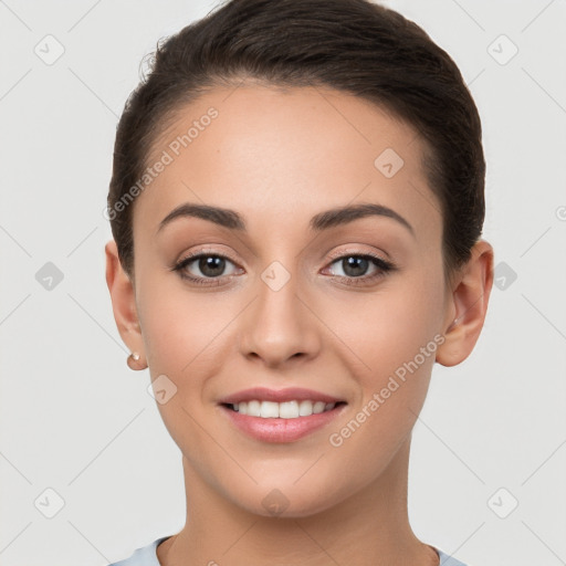 Joyful white young-adult female with short  brown hair and brown eyes