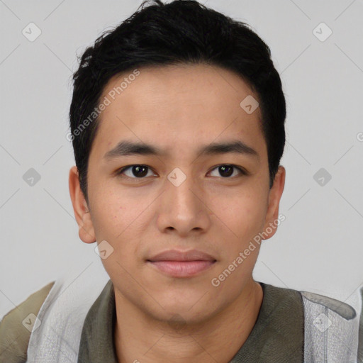 Joyful asian young-adult male with short  black hair and brown eyes