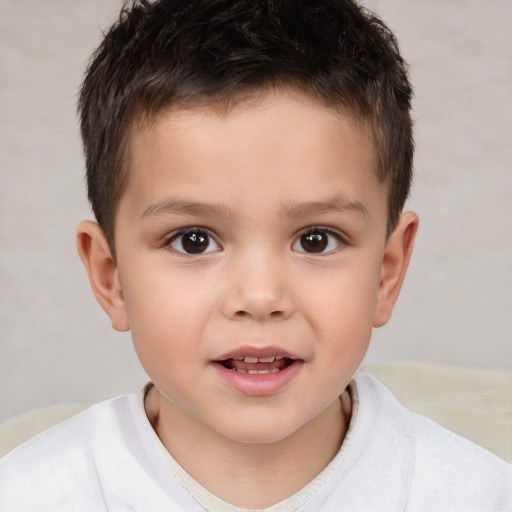 Joyful white child male with short  brown hair and brown eyes