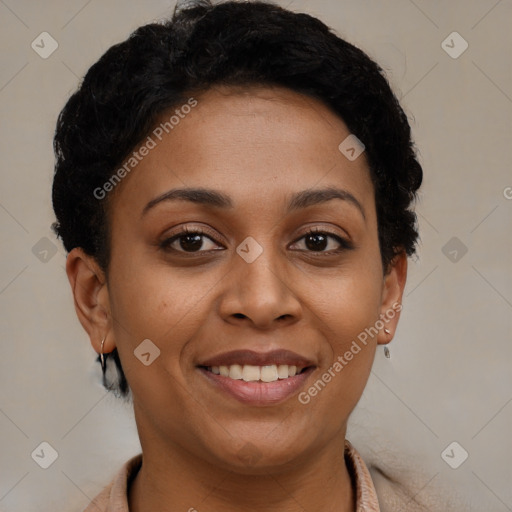 Joyful black young-adult female with short  brown hair and brown eyes