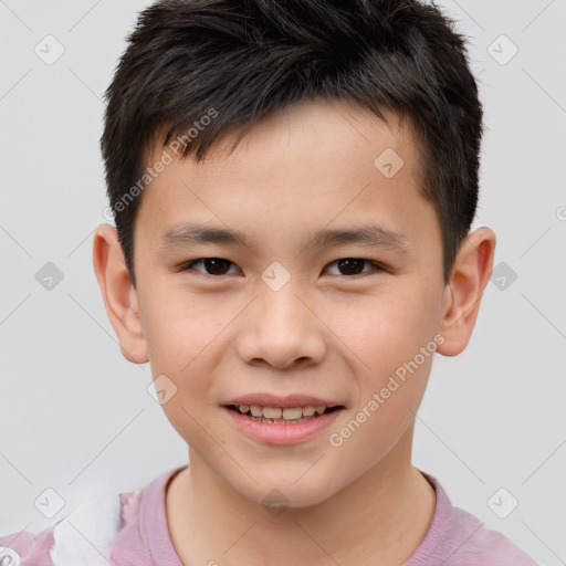 Joyful white child male with short  brown hair and brown eyes