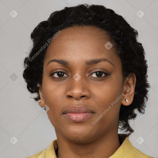 Joyful black young-adult female with medium  black hair and brown eyes