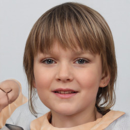 Joyful white child female with medium  brown hair and grey eyes