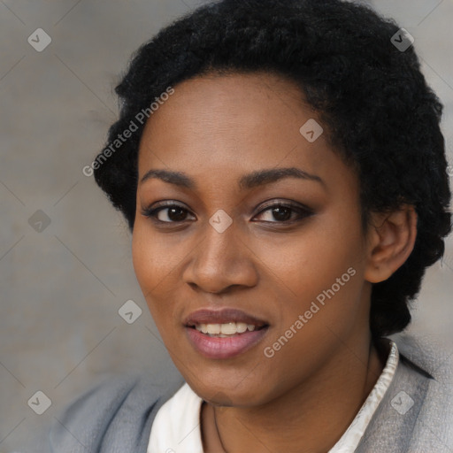 Joyful black young-adult female with short  black hair and brown eyes