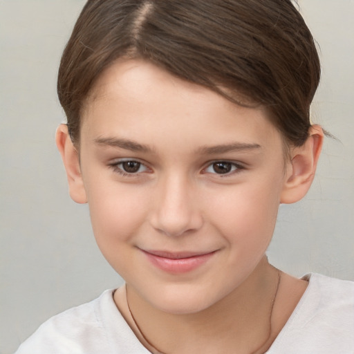 Joyful white child female with short  brown hair and brown eyes