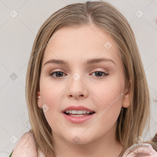 Joyful white child female with medium  brown hair and brown eyes