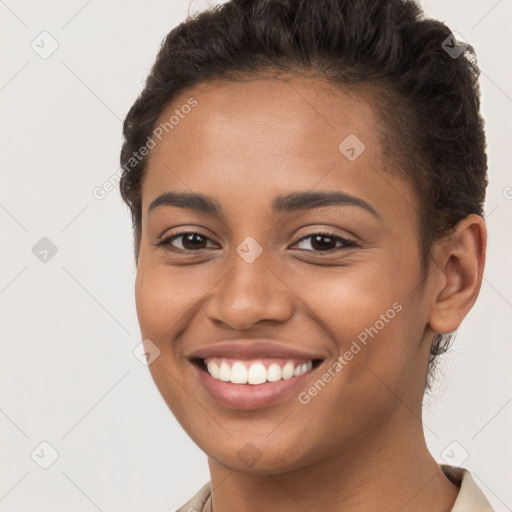 Joyful latino young-adult female with short  brown hair and brown eyes