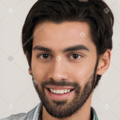 Joyful white young-adult male with short  black hair and brown eyes