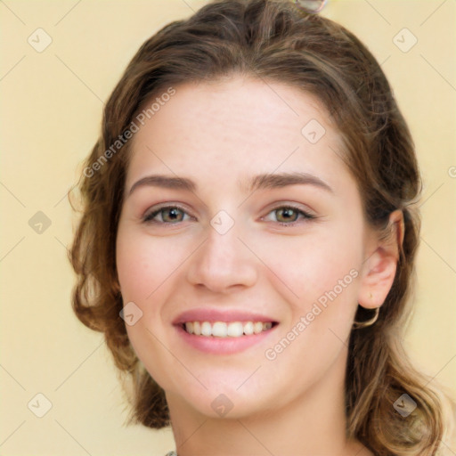 Joyful white young-adult female with medium  brown hair and green eyes