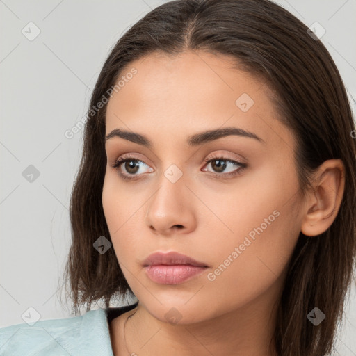 Neutral white young-adult female with long  brown hair and brown eyes