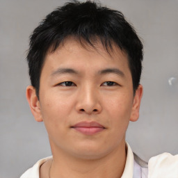 Neutral asian young-adult male with short  brown hair and brown eyes