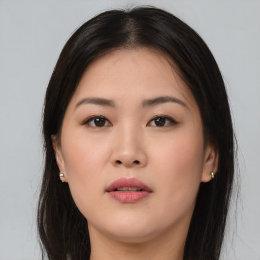 Neutral asian young-adult female with long  brown hair and brown eyes